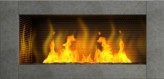 Contemporary modern living flame gas fire inset into wall providing instant heating on demand