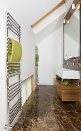 Heating Swansea: Contemporary ladder-style heating radiators in modern bathroom
